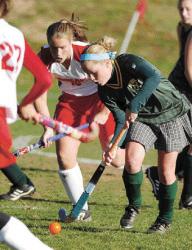 CHRIS KELLY staff Red Bank Catholic&rsquo;s Mary Brogan advances the ball in front of Ocean Township&rsquo;s Nora Bosmans during the Spartans&rsquo; 1-0 Central Jersey Group II quarterfinal win in Ocean on Friday. For story, see Sports. 