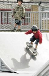 MIGUEL JUAREZ staff Michael Medillo, 7, gets ready to follow buddy Robert Squillari, 6, down the ramp during a &ldquo;Roller Kids&rdquo; session at the Skateplex skateboard park at Seven President&rsquo;s Park in Long Branch.  