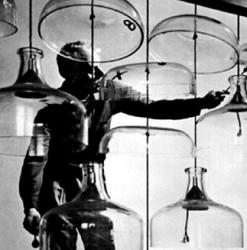 At left, an improvisational opera composed by Wilbo Wright (peering from behind a tuba) will be presented Nov. 17 as part of the Music of Invention series.  PHOTO BY ANDREW WILKINSON