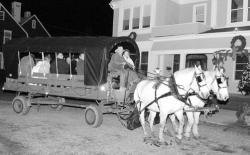 CHRIST KELLY staff Monmouth Beach residents kept up a decade-long tradition Dec. 16 by riding through neighborhoods during the 10th annual Monmouth Beach Christmas Carriage Ride. 