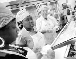 Local mayors helped prepare a meal for mothers and children living at Spring House, a transitional home in Eatontown, April 19. Top to bottom: April Ellis, (l-r) Nekida Duncan and Eatontown Mayor Gerald Tarantolo follow a recipe for an entree they are preparing at Suzanne's Kitchen in Eatontown, a make-and-take culinary kitchen that has formed a fund-raising partnership with Spring House. Tarantolo and Ellis measure ingredients for the meal. Holmdel Mayor Serena DiMaso watches as her kitchen partners mix ingredients for the meal at the kick-off benefit for Spring House.    