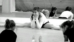 Emily O&rsquo;Connell, artistic director at First Position School of Dance, leads her class in stretching exercises. 