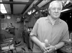 VERONICA YANKOWSKI  Ed Mack, the owner of Edward&rsquo;s Barber Shop, South River, drove to Newark International Airport to help the Port Authority police officers look their best.