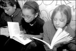 VERONICA YANKOWSKI  Fifth-graders at the Irwin Elementary School, East Brunswick, celebrated    reading Dec. 14 by heading to the hallway for 2002 seconds, or approximately 33 minutes, to close out the year.