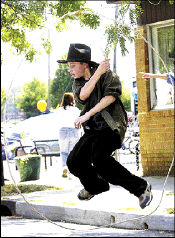 VERONICA YANKOWSKI Jamesburg&rsquo;s second annual Tonkery Boulevard Street Festival was a big hit Saturday, as thousands enjoyed a variety of entertainment. Here, Casey Kies does the Texas skip for the crowd.