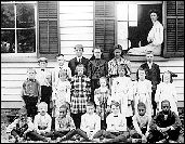 VERONICA YANKOWSKI This 1908 photo of the students in front of the Pleasant Hill School is among the shots displayed as part of a township historical exhibit at the Monroe Township Senior Center.
