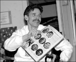 FARRAH MAFFAI Spotswood High School teacher Frank Yusko shows a newspaper he picked up on eBay featuring some of the original members of the Abraham Lincoln Brigade.