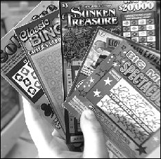Student involvement  in addictive behaviors 		Alcohol	Drugs	Cigarettes	Gambling	 At least once yearly Grade  	7	36.8%	3.5%	18.2%	79.1% 	9	62.2%	13.4%	34.5%	78.9% 	11	79.8%	26.5%	48.4%	83.4%  On a weekly basis Grade 	7	7.4%	3.5%	7.0%	30.4% 	9	14.0%	13.4%	16.1%	37.4% 	11	20.2%	26.5%	31.4%	37.1% Source: Gupta & Derevensky,1998, McGill University PHOTO BY VERONICA YANKOWSKI Scratch-off lottery tickets are sometimes used by teachers to reward students.