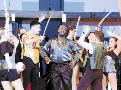 CHRIS KELLY The Saint Genesius Players rehearse a scene from Pippin at the Middlesex County Vocational and Technical High School, East Brunswick, Tuesday. The play will be staged July 11, 12, 13, 18 and 19 at the Rues Lane campus.