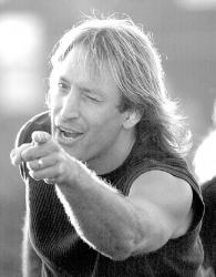 VERONICA YANKOWSKI Elvio Nardi, lead singer of Bon Jovi tribute band Runaway, emulates the Sayreville-bred rocker as he and the band perform at Geick Park in Old Bridge on July 30.