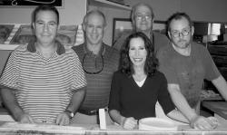 Left: Greater Media Newspapers' Bob Noppe (second from left) judged the dessert pizza contest along with Todd Mayo and Alfredo DeBonis, pictured with Dawn and Colm Shanahan. Above: Judges Alfredo DeBonis and Todd Mayo try out the top five contenders. Below: Elizabeth Cappel's blueberry lemon pie dessert pizza took third. 