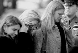 Family members grieve over the loss of David B. Crabiel, the longtime Middlesex County Board of Chosen Freeholders director, during funeral services last week. 