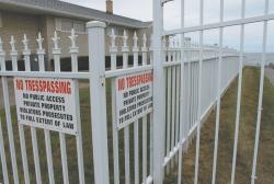  Advocates staged a protest in April to call attention to restricted public access to local beaches like this gated entryway in Elberon. 