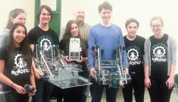  Ranney School Robotics Club members (l-r): Ava Papetti, Colts Neck; Marykatherine Horan, Rumson; Raymond Moser, Shrewsbury; Samantha Chiarello, Holmdel; coach Ray Moser; Brandon Gioggia, Belford; Vasilios Nicholas, Holmdel; and Amy Winkler, Manasquan, pose with their robots at the 2013 VEX World Robotics Championship Tournament. The Upper School robotics team traveled to California recently to compete in the tournament. Some 700 teams competed at the middle school, high school and college level. Qualifying for the championship meet placed the Ranney team in the top 9 percent of all teams worldwide. 