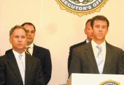  Monmouth County Acting Prosecutor Christopher Gramiccioni (r) announces a partnership with the office of U.S. Attorney Paul Fishman (l) on an initiative to crack down on gunrelated and violent crimes in Monmouth County.  KENNY WALTER/STAFF 