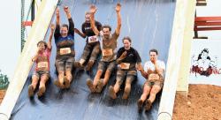  The 50-foot waterslide is one of the highlights of the Rugged Maniac 5K Obstacle Race coming to Raceway Park on July 12-13. Competitors will tackle 25 obstacles, including a tunnel and fire, during the 5K race. 