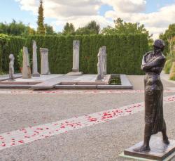  PHOTO BY DAVID W. STEELE &ldquo;Standing Figure&rdquo; from Leonda Finke&rsquo;s &ldquo;Women in the Sun&rdquo; stands in front of &ldquo;The Nine Muses&rdquo; by Carlos Dorrien at Grounds for Sculpture in Hamilton. 
