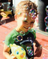  Trevor Dowd creates a burst of iridescent bubbles using a gift from his aunt, Donna Turner. Trevor, who lives with his family in Georgia, was visiting relatives in Holmdel. Photos may be emailed to StringFly@GMNews.com.  READER SUBMITTED PHOTO BY DONNA TURNER 