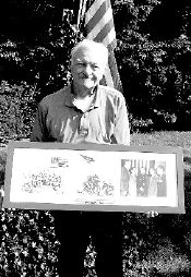 DAVE BENJAMIN  PFC Fred John Walczak, Easy Company, 28th Marine Patrol, holds photos taken and signed by Associated Press photographer Joe Rosenthal after the capture of Mount Suribachi, Iwo Jima. Photo on right (in frame) was taken at a reunion of survivors. 