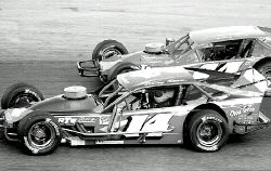 JEFF HUNTLEY Freehold&rsquo;s Harry Reed (No. 14) competes in one of the twin small-block Modified races at Wall Stadium on Saturday. Reed&rsquo;s two top-five finishes helped him gain ground on points leader Tim Arre of Toms River. 