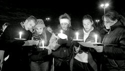 JERRY WOLKOWITZ  Colts Neck High School students remember the victims of drunken drivers during a Dec. 7 candlelight vigil at the school. 