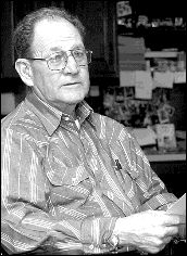 JERRY WOLKOWITZ  Taylor Palmer, owner of Boxwood Farm, speaks with fellow farmers during a discussion session held to plan a re-sponse to a municipal plan to rezone farmland in Manalapan.