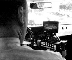SARAH McCOLGAN  Colts Neck Police Chief Kevin Sauter operates the department&rsquo;s new Nightsight thermal-imaging camera from inside a police vehicle.