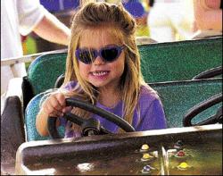 SARAH McCOLGAN  Anticipating the day she can really hit the open road, Morrea Cioppa, 3, of Brick, takes a spin at the Monmouth County Fair, Freehold Township.