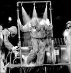 JERRY WOLKOWITZ  Members of the Monmouth County Haz-Mat Team and the New Jersey State Police bomb squad decontaminate themselves after examining a suspicious package found at the Marlboro post office, Route 79, July 24.