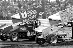 SARAH McCOLGAN Paul McMahon passes Steve Kinser in front of a standing-room-only crowd to win the eight-lap Channellock Dash at New Egypt Speedway on July 30.