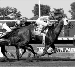 FARRAH MAFFAI Point Given and jockey Gary Stevens cross the finish line to win Sunday&rsquo;s Haskell Invitational at Monmouth Park in Oceanport.
