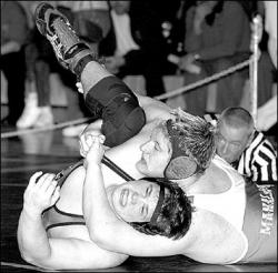 CHRIS KELLY  Manalapan&rsquo;s Dan Brown works a farside cradle against Jackson&rsquo;s Joe Silisky during a heavyweight bout on Saturday at Southern Regional.