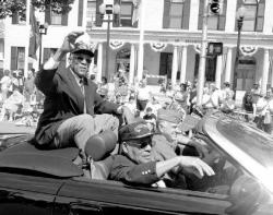 MIGUEL JUAREZ staff Veterans representing the famed Tuskegee Airmen of World War II wave to the crowd during the Memorial Day parade in downtown Freehold Borough on May 30. 