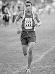 ANDREW MILLER staff Manalapan's Robby Andrews finished third in the championship race at the Cougar Invitational Cross-Country meet at Bucks Mill Park in Colts Neck. 