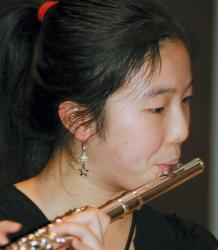 Frances Lin, 18, of Holmdel, plays flute with the orchestra. 