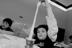 JEFF GRANIT staff Daniel Defeo, 8, tries to see how far he can stretch the slime he made during a science program that was sponsored by the Marlboro Recreation Department. Activities included dry ice, laser lights, rocket building, Space: The Final Frontier, and slime. 