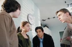 ERIC SUCAR staff Actors (l-r) John Yazzo, 14, Madison Samilow, 11, and Lawrence Grotts listen to suggestions from director Joseph Pernice (r) during the filming of a movie in Marlboro. Pernice, a Marlboro native, is a film student at New York University. 