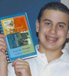 For his bar mitzvah project, Shawn Srolovitz created a book of recipes, with profits to be donated to the Freehold Area Open Door food pantry. 