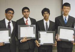 AMY ROSEN Manalapan High School students (l-r) Vaidhy Murti, Jeremy Puthumana, Tejas Srinivasan and Mojin Chen were honored for their entry in the ExploraVision science competition, which is sponsored by Toshiba and administered by the National Science Teachers Association. The students, who attend the Science and Engineering Learning Center at Manalapan, developed a theory that uses innovative gene therapy technology to cure AIDS. 